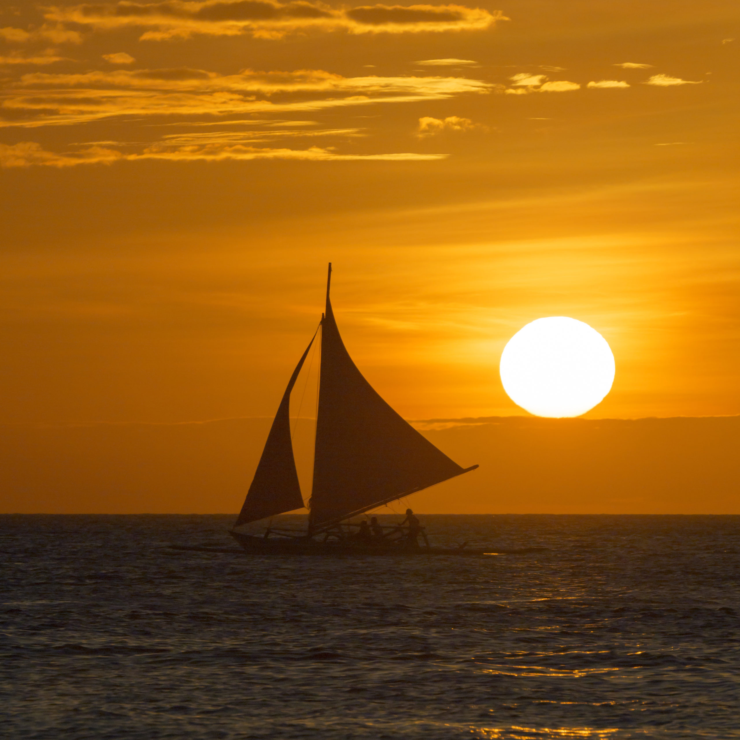sailboat at sunset images
